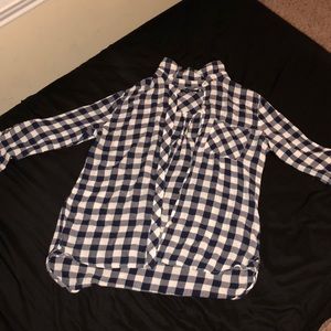 A navy blue and white flannel button up